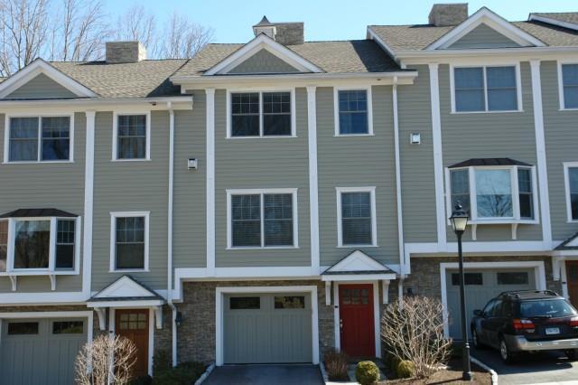 66 Grove Street, Unit B11 Ridgefield, CT 06877 - Photo 1 of 1 a front view of a house with a yard