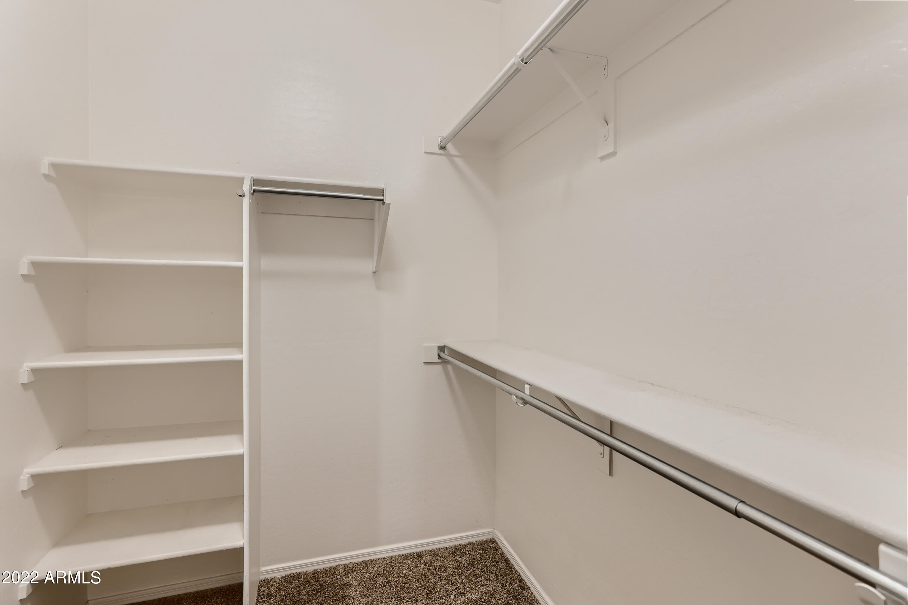 15345 West Charter Oak Road Surprise, AZ 85379 - Photo 21 of 33 20-466069832-24 Primary Bedroom Closet