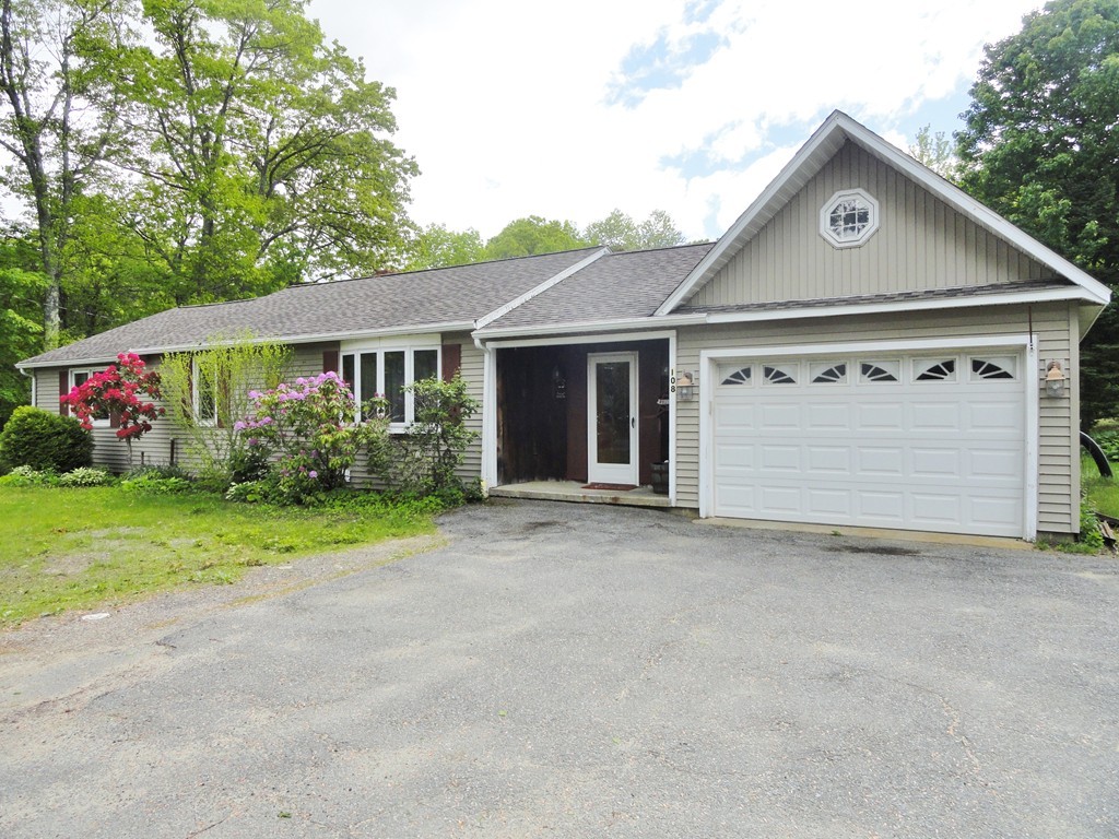 108 Knower Road Westminster, MA 01473 - Photo 1 of 25 front view of house with a yard and trees all around