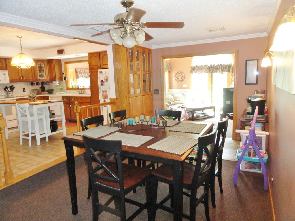 108 Knower Road Westminster, MA 01473 - Photo 15 of 25 a view of a dining room with furniture window and outside view
