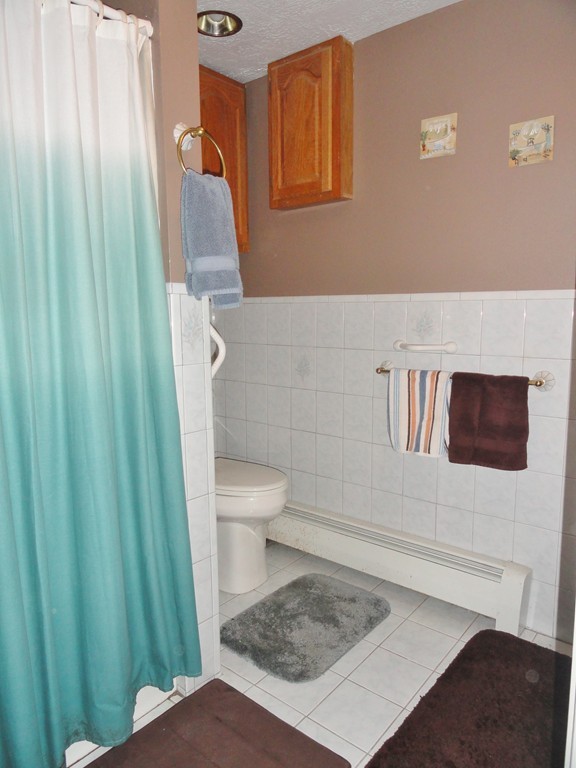 108 Knower Road Westminster, MA 01473 - Photo 19 of 25 a bathroom with a toilet and a shower