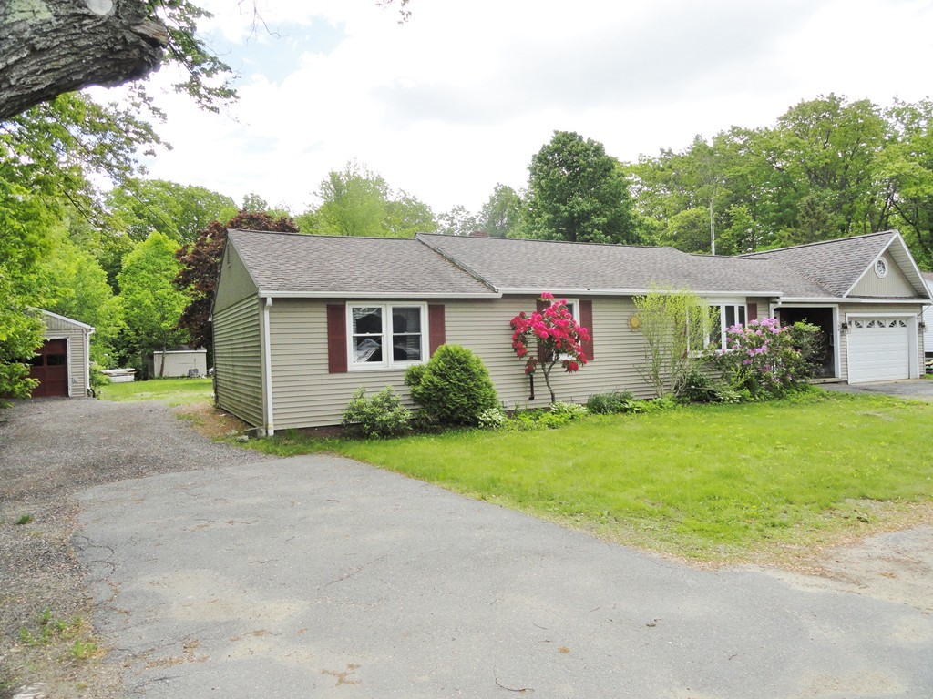 108 Knower Road Westminster, MA 01473 - Photo 2 of 25 a front view of a house with garden