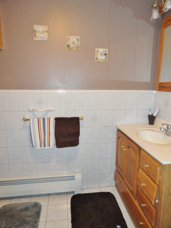 108 Knower Road Westminster, MA 01473 - Photo 22 of 25 a bathroom with a sink and a mirror