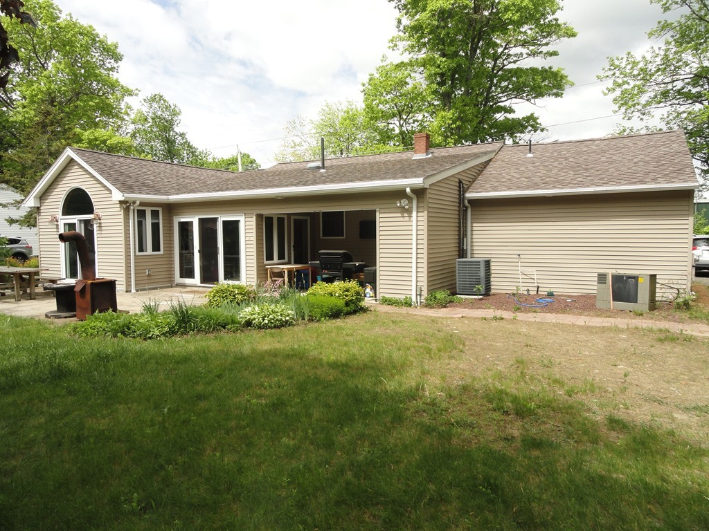 108 Knower Road Westminster, MA 01473 - Photo 25 of 25 a front view of a house with a yard and garage