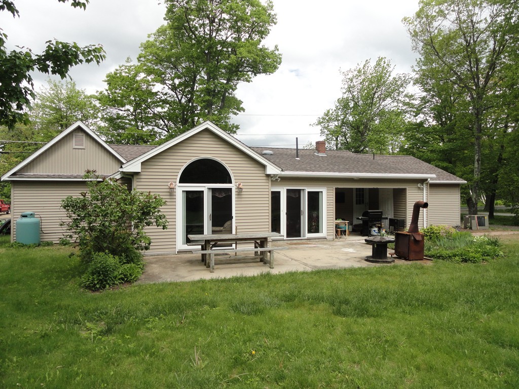 108 Knower Road Westminster, MA 01473 - Photo 4 of 25 a front view of house with yard and green space