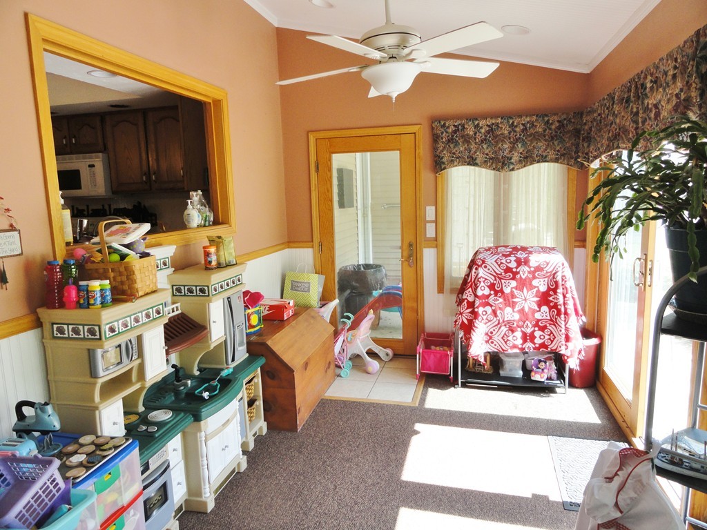 108 Knower Road Westminster, MA 01473 - Photo 9 of 25 a living room with lots of furniture and a chandelier