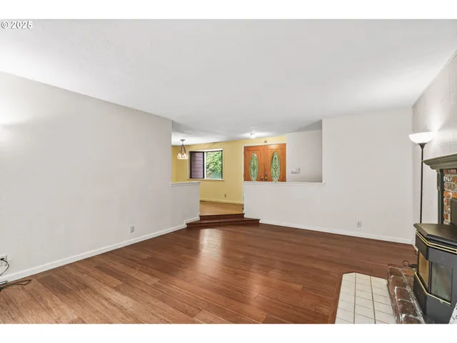 a view of a kitchen and dining room