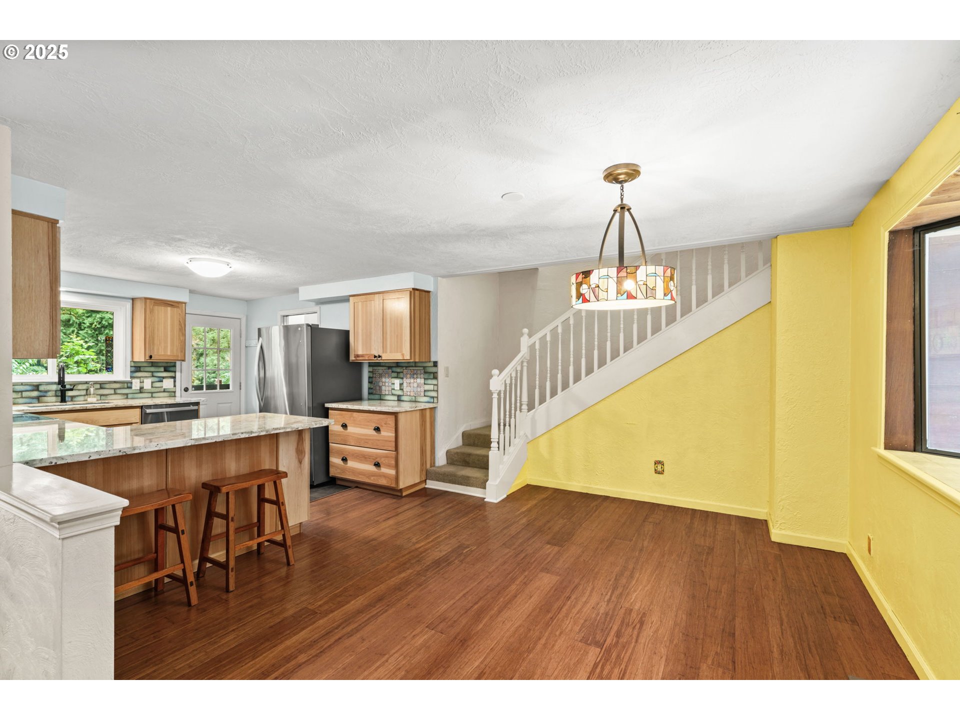 40153 Booth Kelly Road Springfield, OR 97478 - Photo 16 of 44 a view of a kitchen and dining room