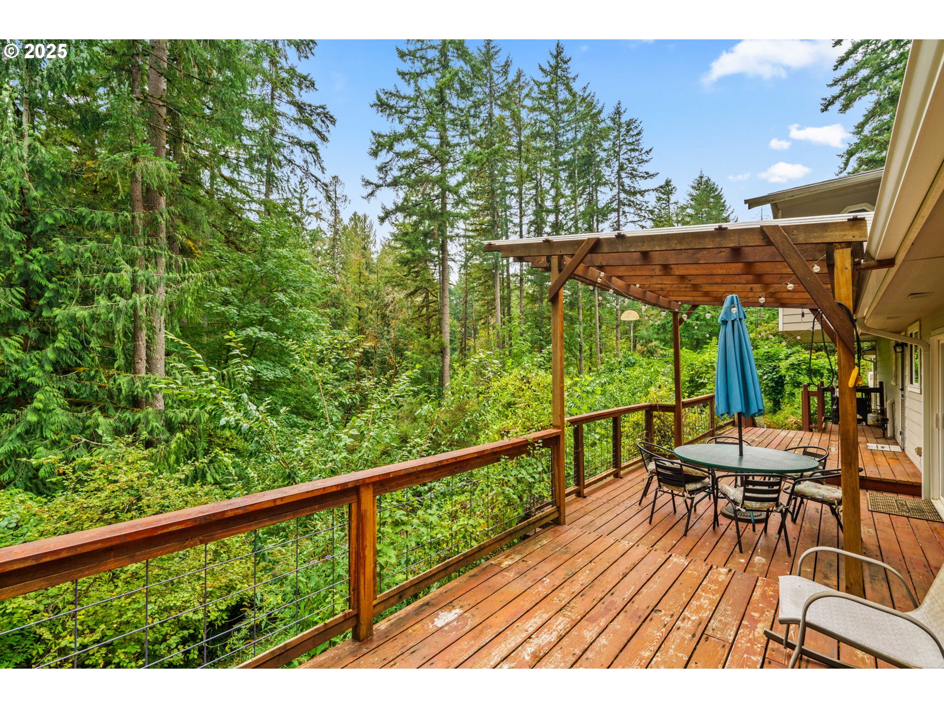 40153 Booth Kelly Road Springfield, OR 97478 - Photo 17 of 44 a view of balcony with furniture and wooden deck