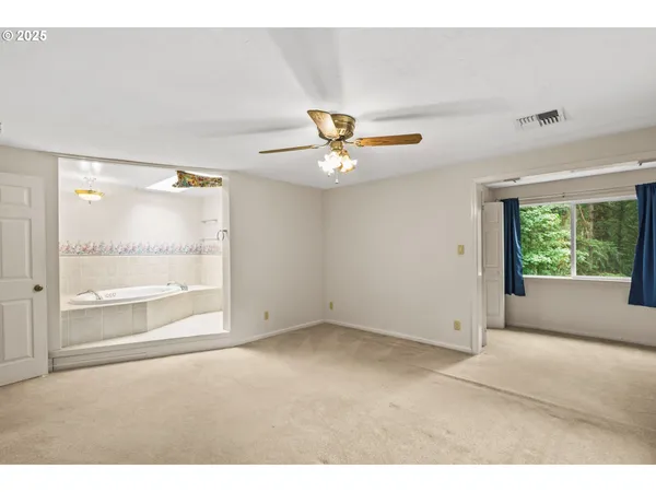 a bathroom with a sink and a window