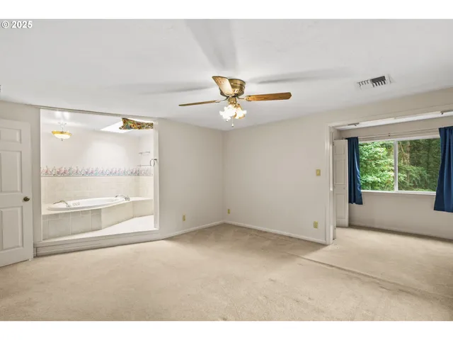 a bathroom with a sink and a window