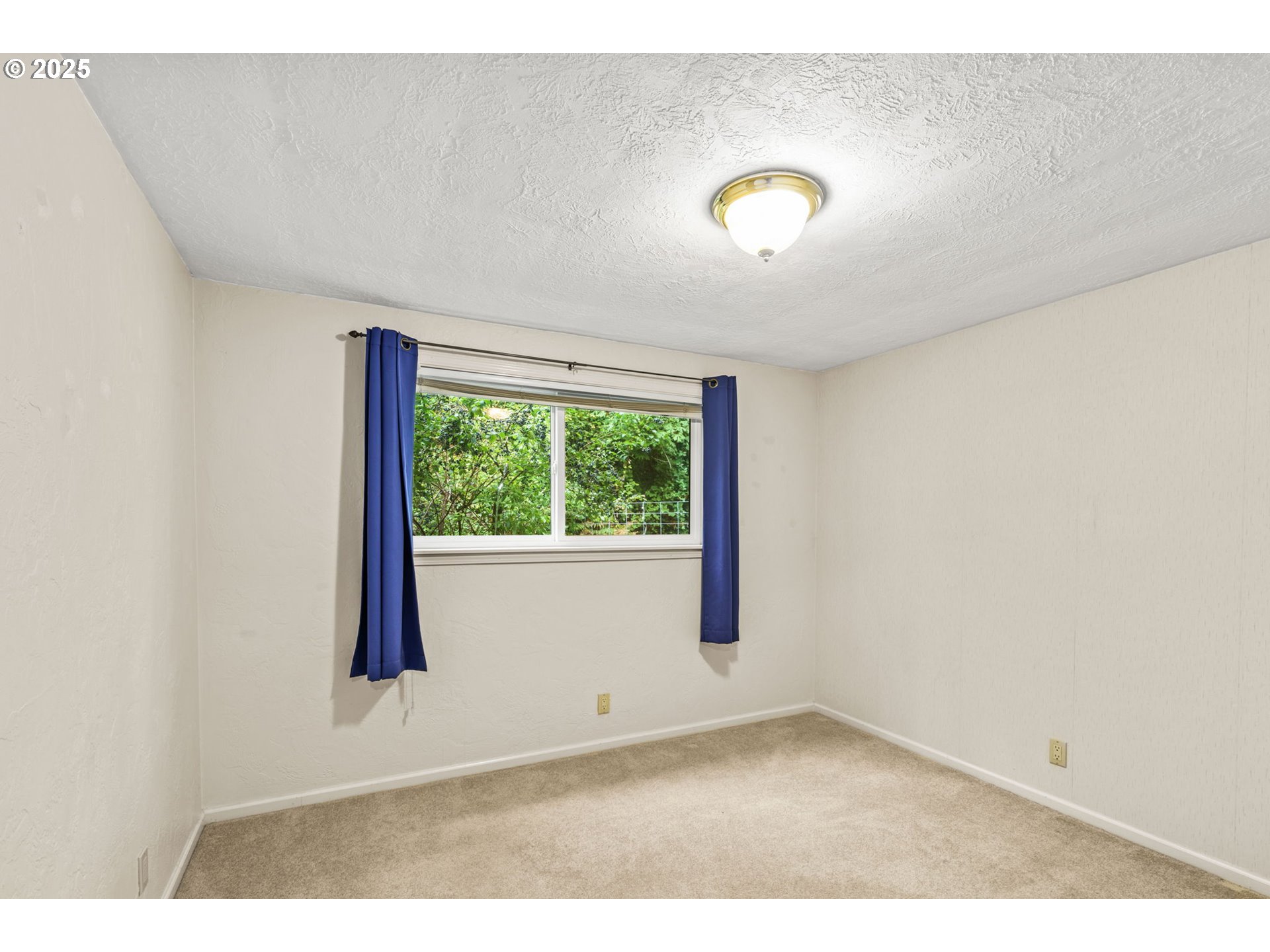 40153 Booth Kelly Road Springfield, OR 97478 - Photo 38 of 44 a view of an empty room with a window
