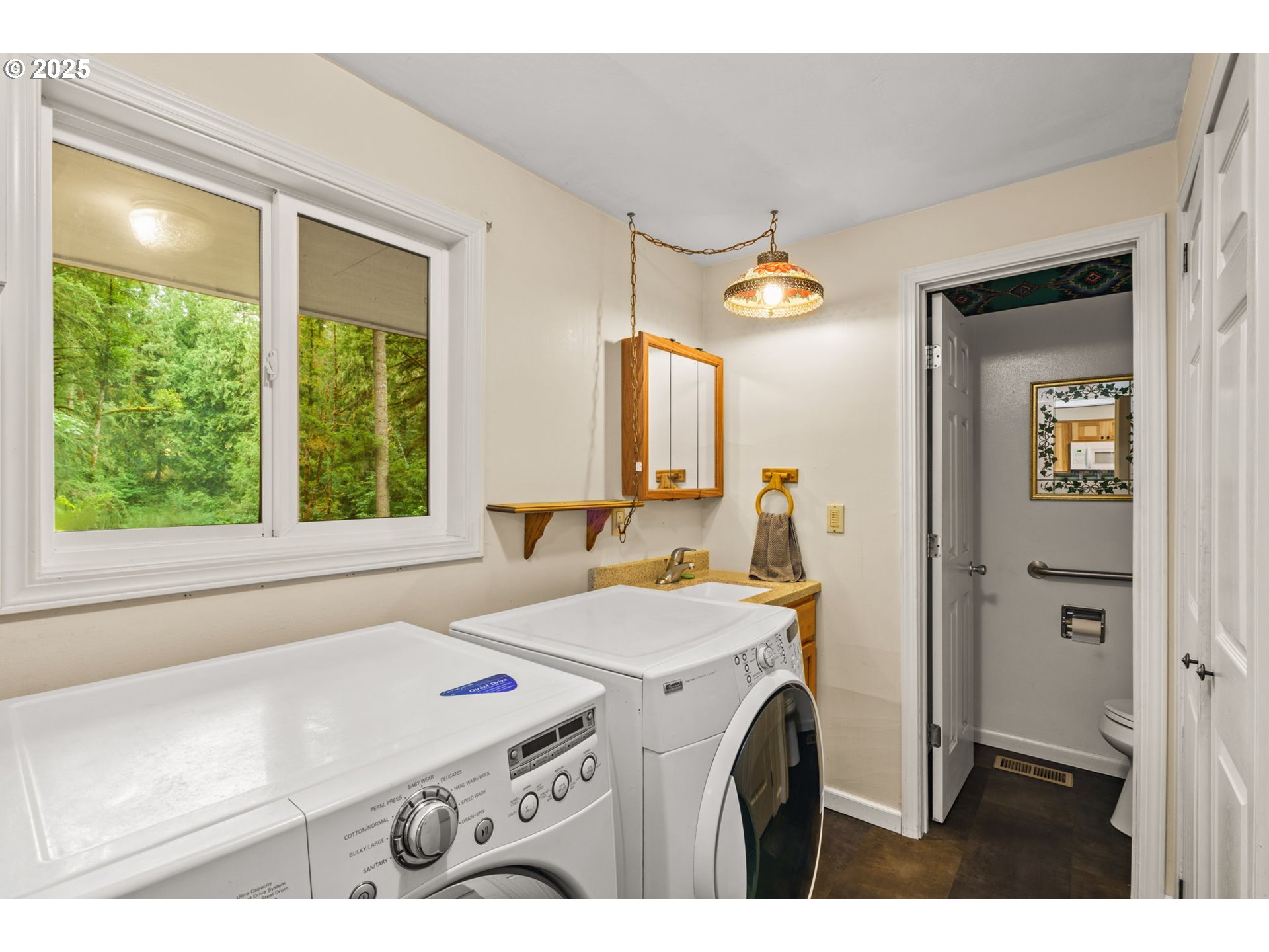 40153 Booth Kelly Road Springfield, OR 97478 - Photo 40 of 44 a utility room with closet dryer and washer