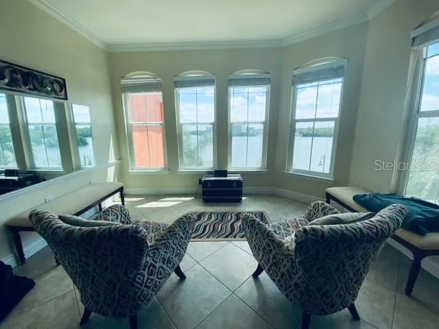 a living room with furniture and a window