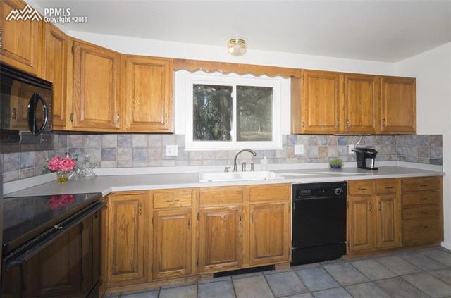 4315 Red Forest Road Monument, CO 80132 - Photo 4 of 32 open flow kitchen