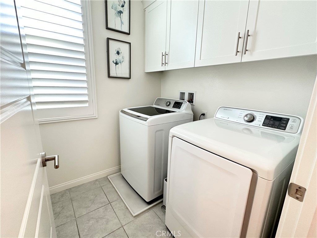 35 Hideaway Loop Mission Viejo, CA 92692 - Photo 15 of 24 a utility room with dryer and washer