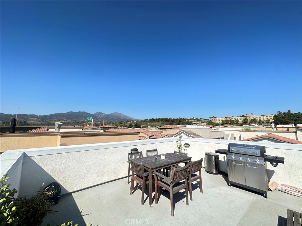 35 Hideaway Loop Mission Viejo, CA 92692 - Photo 17 of 24 a view of a terrace with furniture and stove