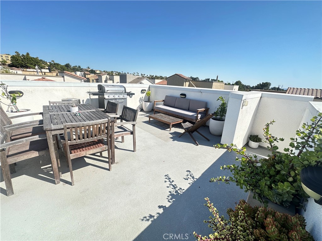 35 Hideaway Loop Mission Viejo, CA 92692 - Photo 19 of 24 an aerial view of a chairs and table on the terrace
