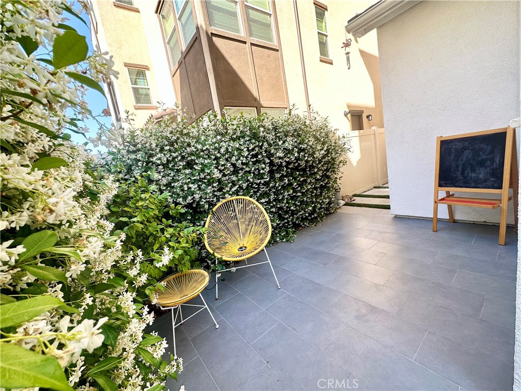 35 Hideaway Loop Mission Viejo, CA 92692 - Photo 20 of 24 a view of a chairs and table in the patio