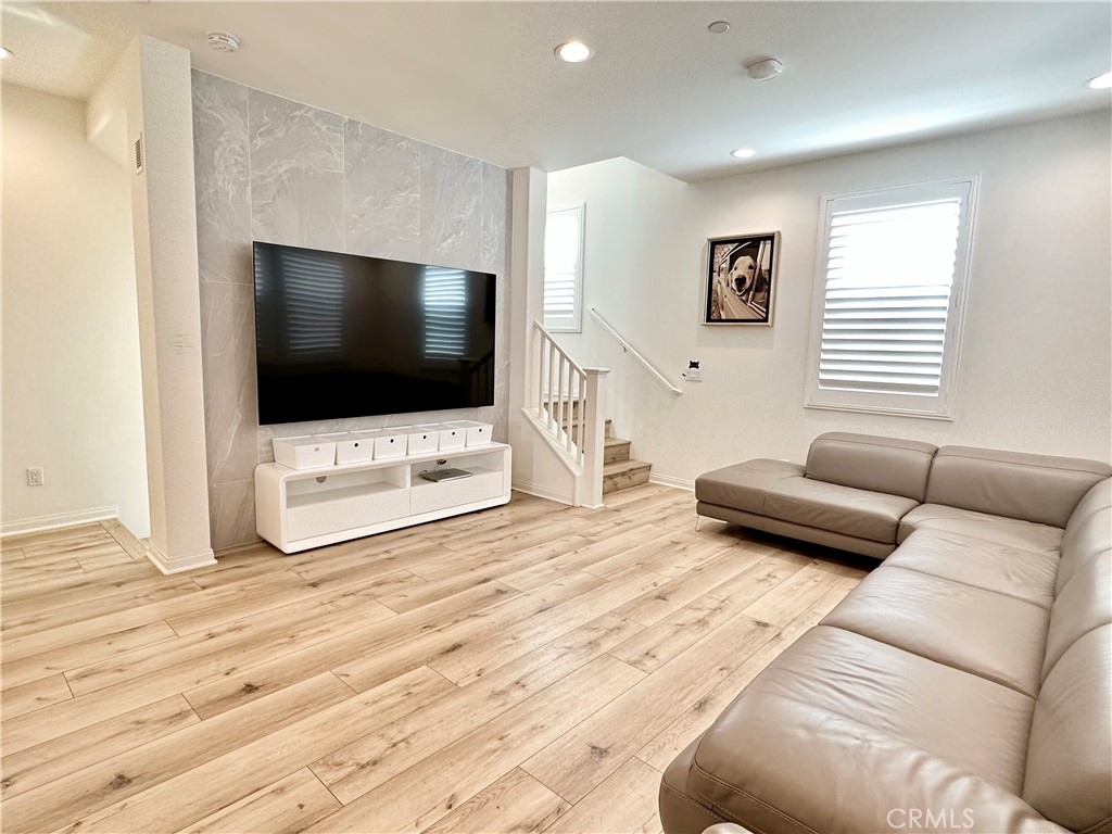35 Hideaway Loop Mission Viejo, CA 92692 - Photo 5 of 24 a living room with furniture and a flat screen tv
