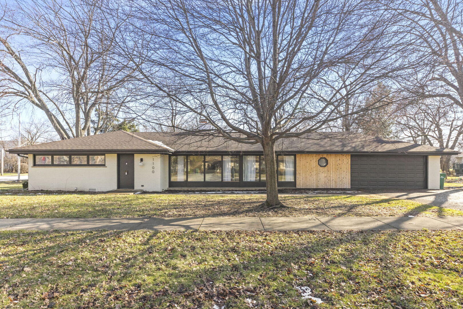 a house with trees in front of it