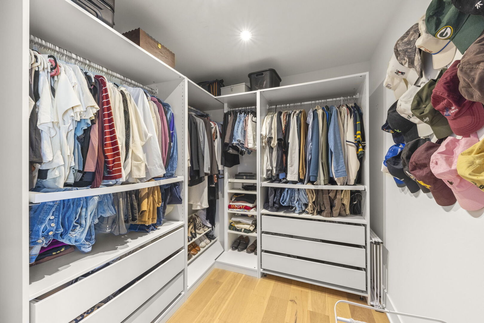 1100 South Westmore-Meyers Road Lombard, IL 60148 - Photo 13 of 28 a view of walk in closet with clothes and shoes