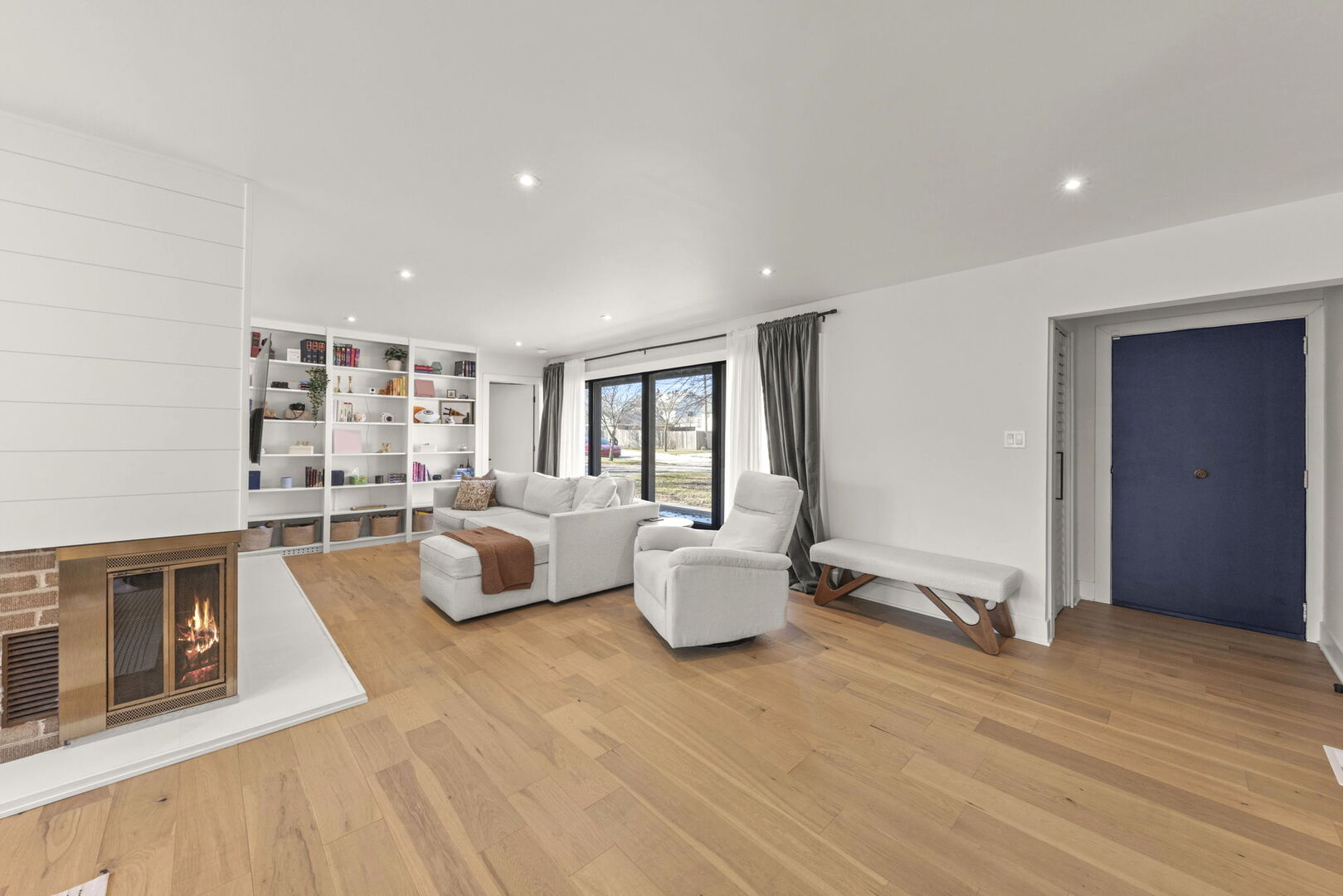 1100 South Westmore-Meyers Road Lombard, IL 60148 - Photo 3 of 28 a living room with furniture and wooden floor