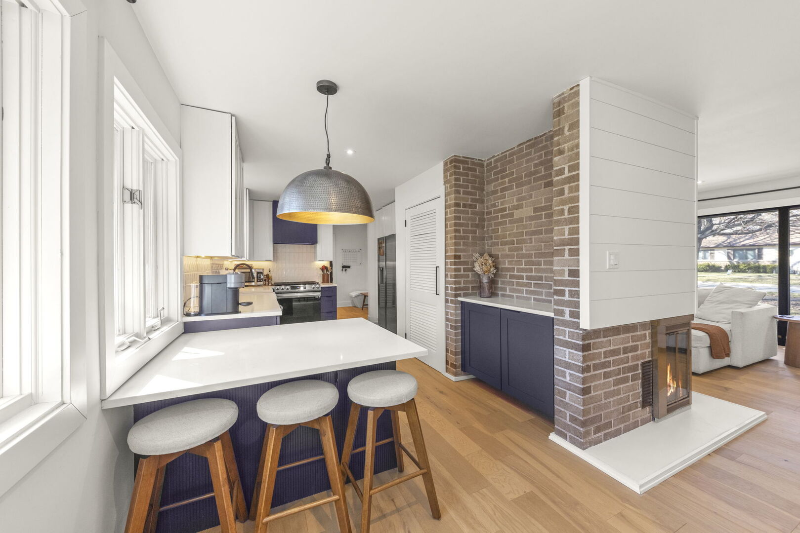 1100 South Westmore-Meyers Road Lombard, IL 60148 - Photo 9 of 28 a kitchen with a table chairs and a wooden floor