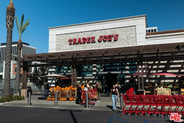 a front view of a house with sitting area