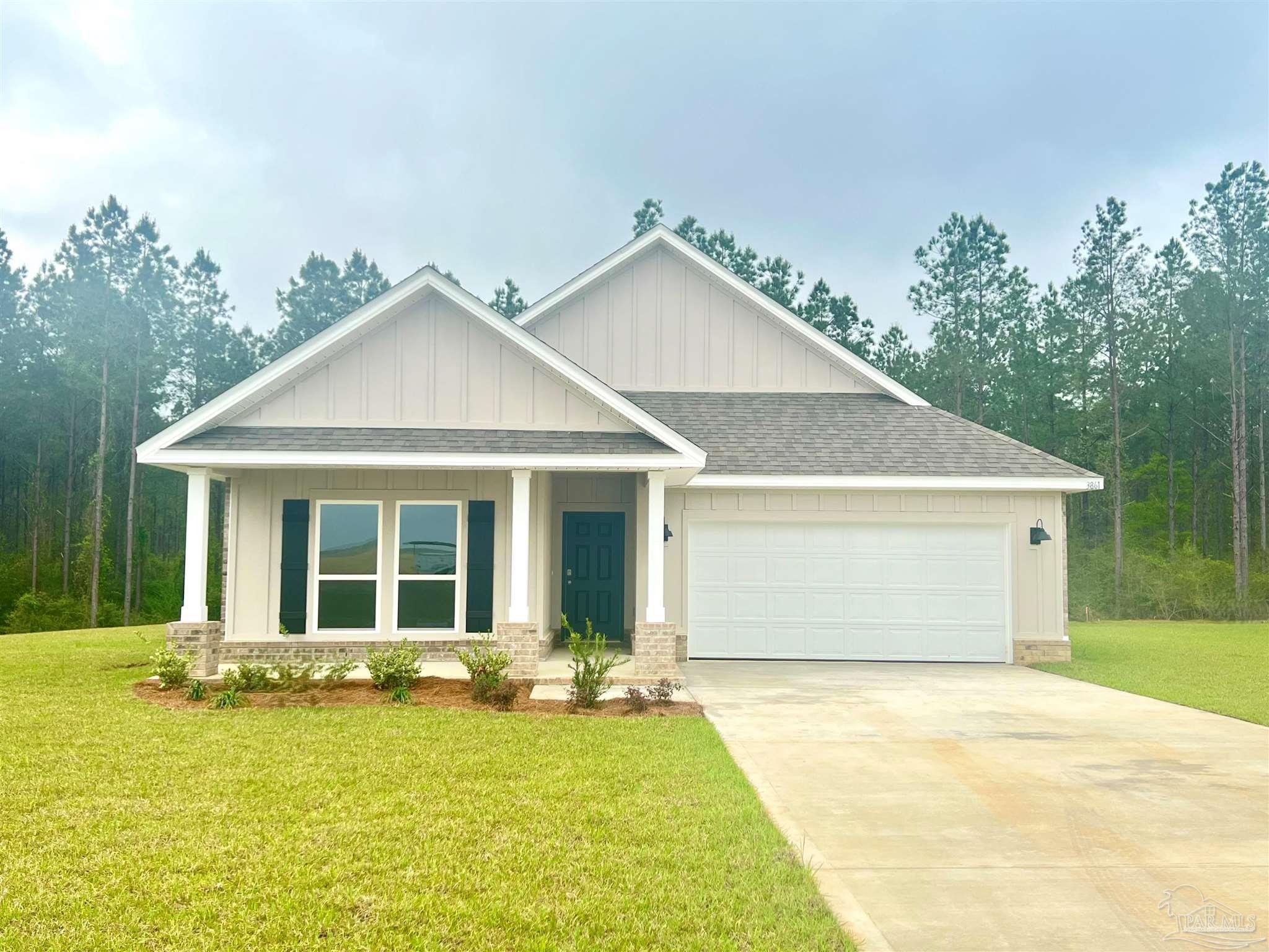 3861 Eagle Tail Drive Jay, FL 32565 - Photo 1 of 20 a view of a house with yard and tree