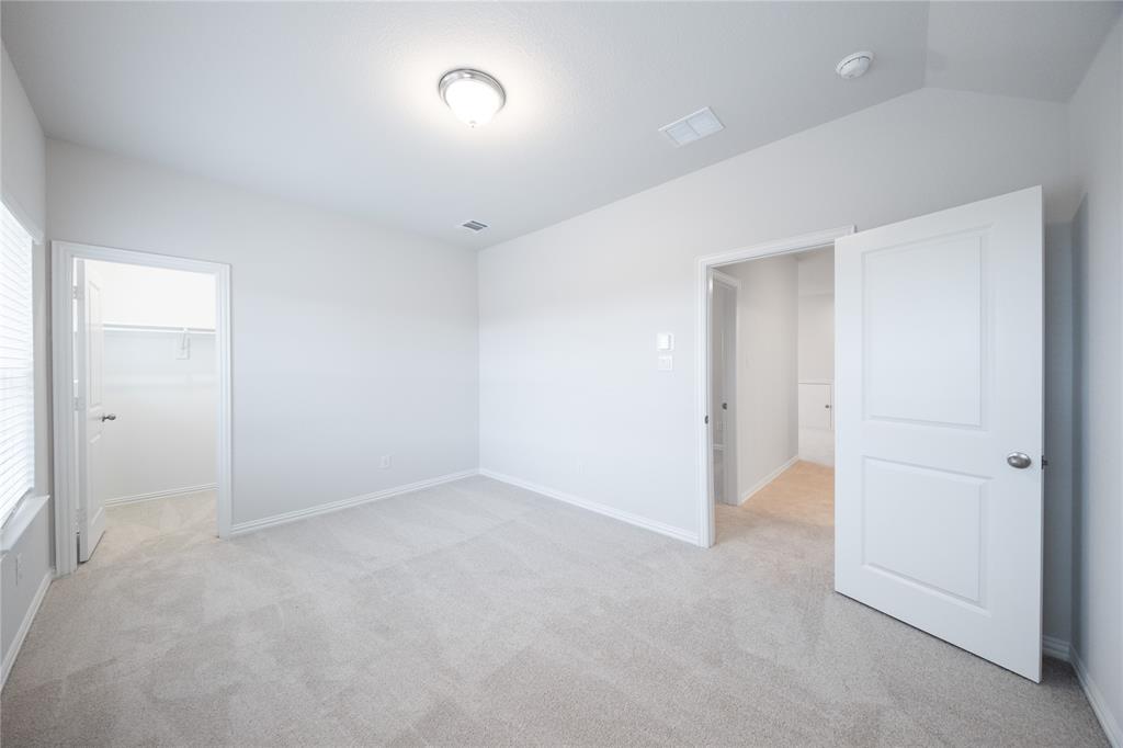 2606 Hawkins Street Anna, TX 75409 - Photo 5 of 31 an empty room with an entryway