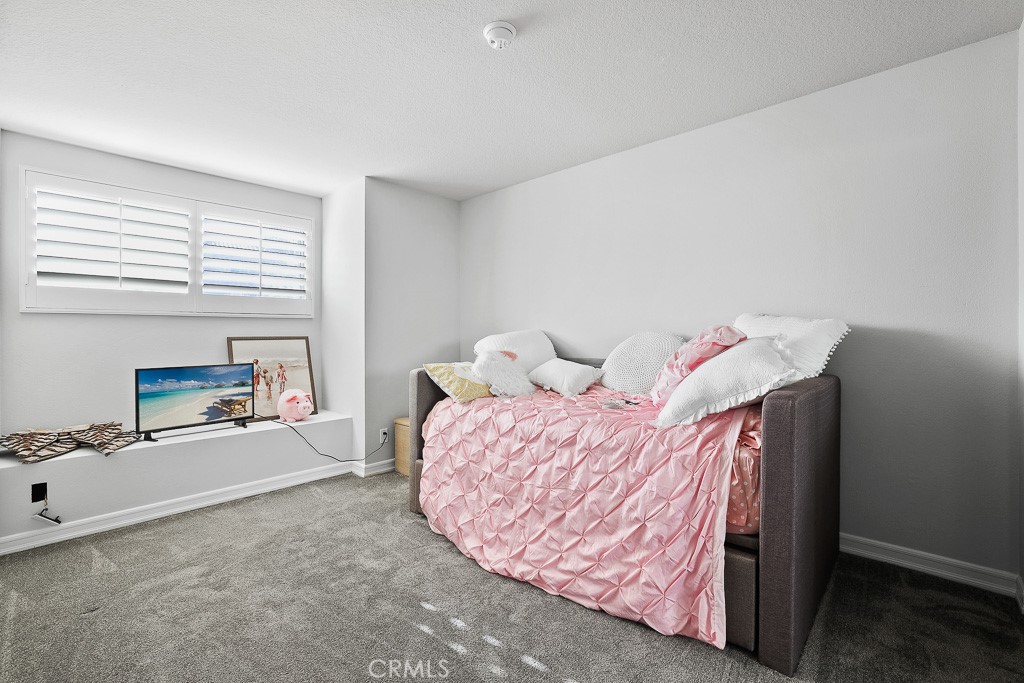 58 Via Candelaria Coto de Caza, CA 92679 - Photo 11 of 17 a bed room with a bed and a chair