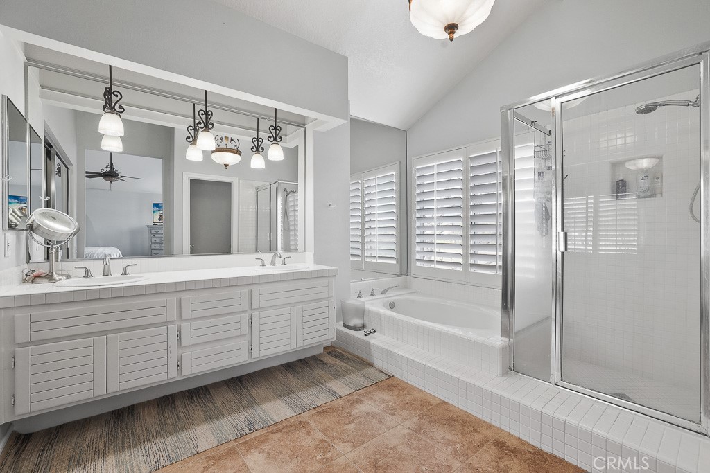 58 Via Candelaria Coto de Caza, CA 92679 - Photo 14 of 17 a spacious bathroom with a tub sink and mirror