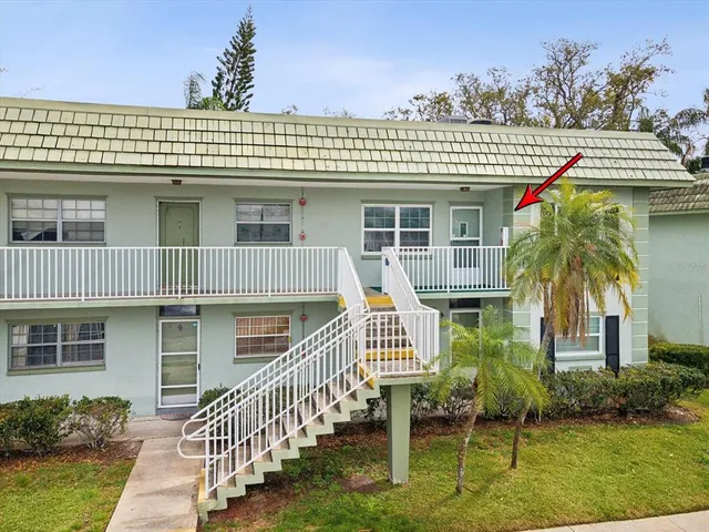 a front view of a house with a porch