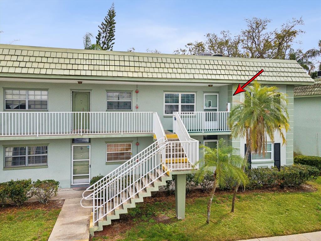a front view of a house with a porch