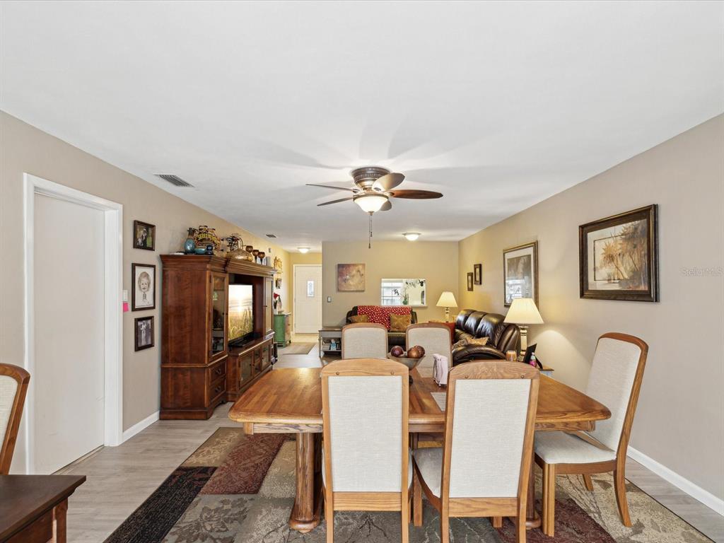 1433 South Belcher Road, Unit F20 Clearwater, FL 33764 - Photo 13 of 57 a view of a dining room with furniture