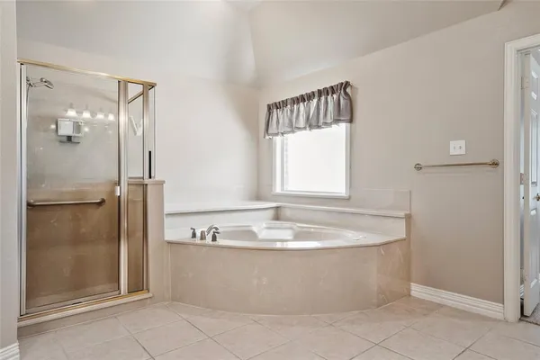 a view of a bath tub sitting in a bathroom
