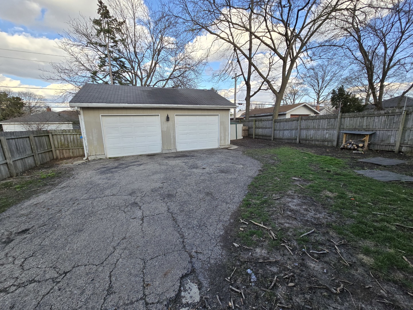185 Pick Avenue Elmhurst, IL 60126 - Photo 24 of 24 a view of a house with a yard and garage