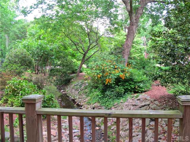2221 Oxford Road Raleigh, NC 27608 - Photo 23 of 24 a view of a wooden fence