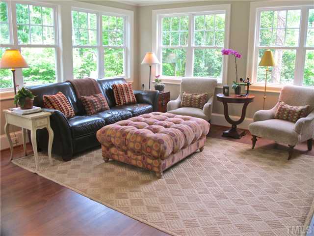 2221 Oxford Road Raleigh, NC 27608 - Photo 5 of 24 a living room with furniture and a large window