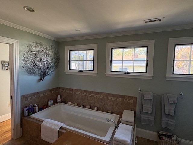 17 Central Street Marblehead, MA 01945 - Photo 12 of 21 a bathroom with a tub sink and mirror