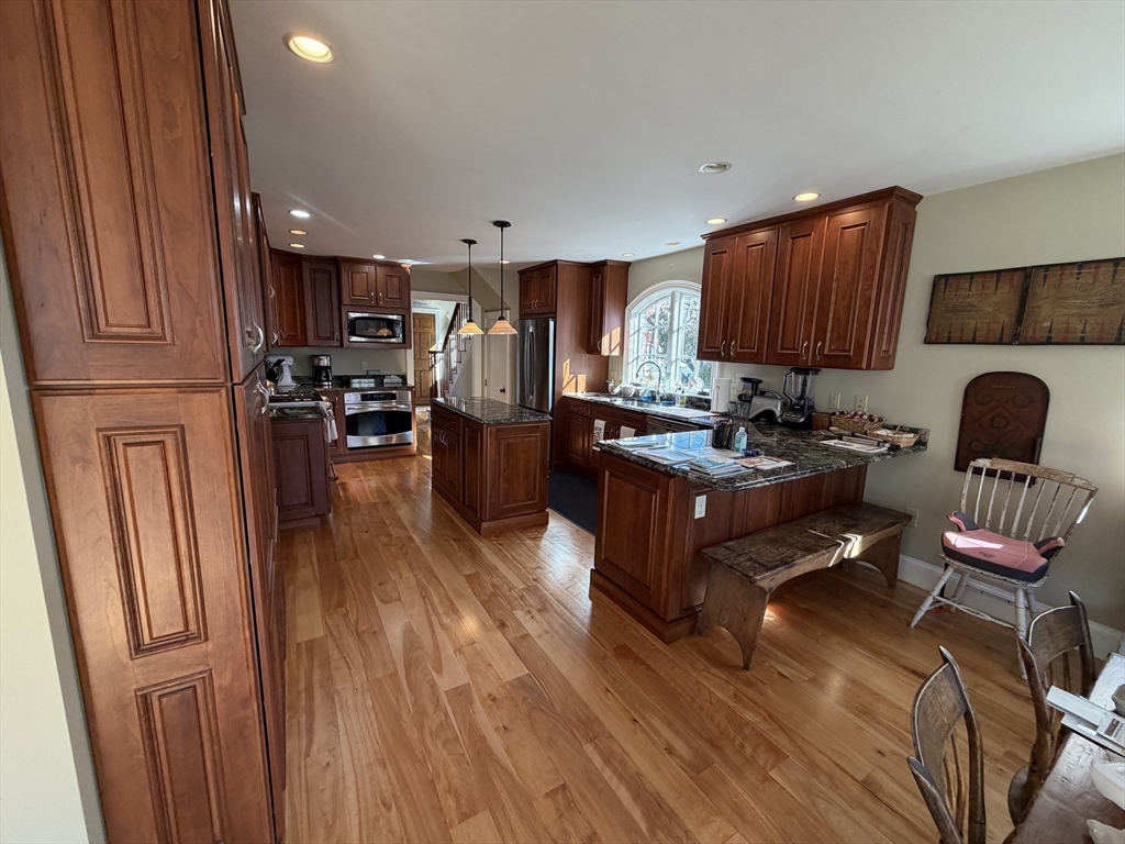 17 Central Street Marblehead, MA 01945 - Photo 3 of 21 a living room with furniture fireplace and view