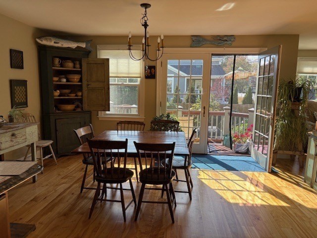17 Central Street Marblehead, MA 01945 - Photo 4 of 21 a view of a dining room with furniture and wooden floor