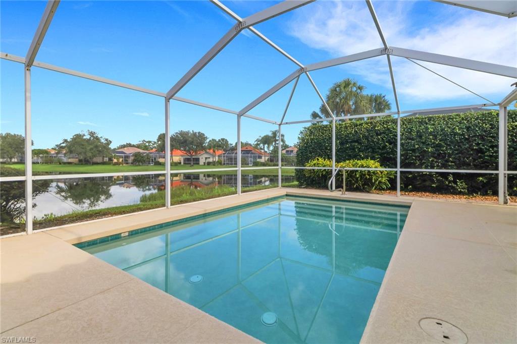 3751 Exuma Way Naples, FL 34119 - Photo 27 of 33 a view of a backyard with a ocean view