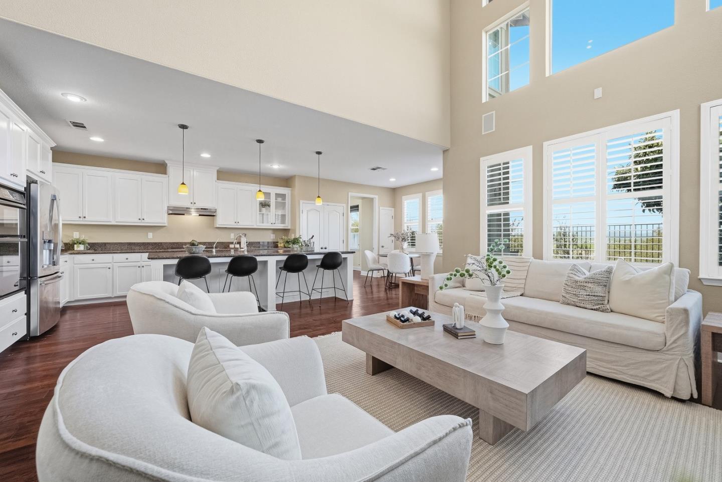 806 Mornington Court San Ramon, CA 94582 - Photo 13 of 58 a living room with stainless steel appliances kitchen island granite countertop a couch and a view of kitchen