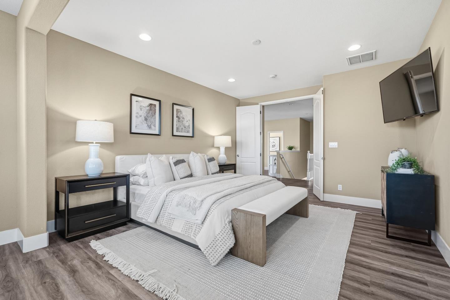806 Mornington Court San Ramon, CA 94582 - Photo 31 of 58 a spacious bedroom with a bed and a flat screen television