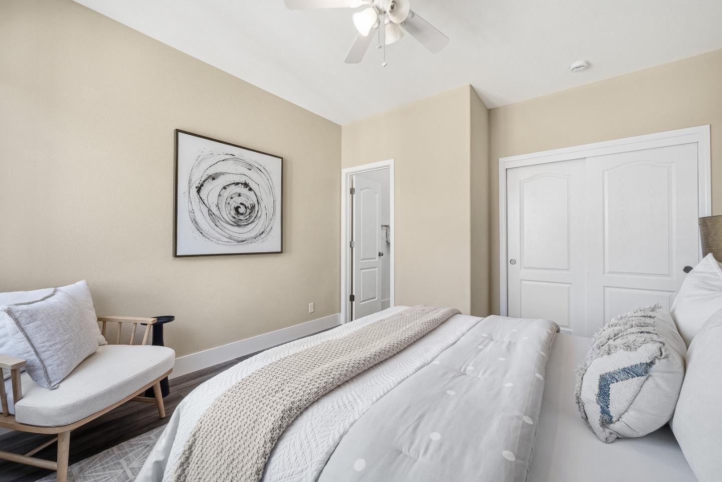 806 Mornington Court San Ramon, CA 94582 - Photo 38 of 58 a bedroom with a bed and a chandelier