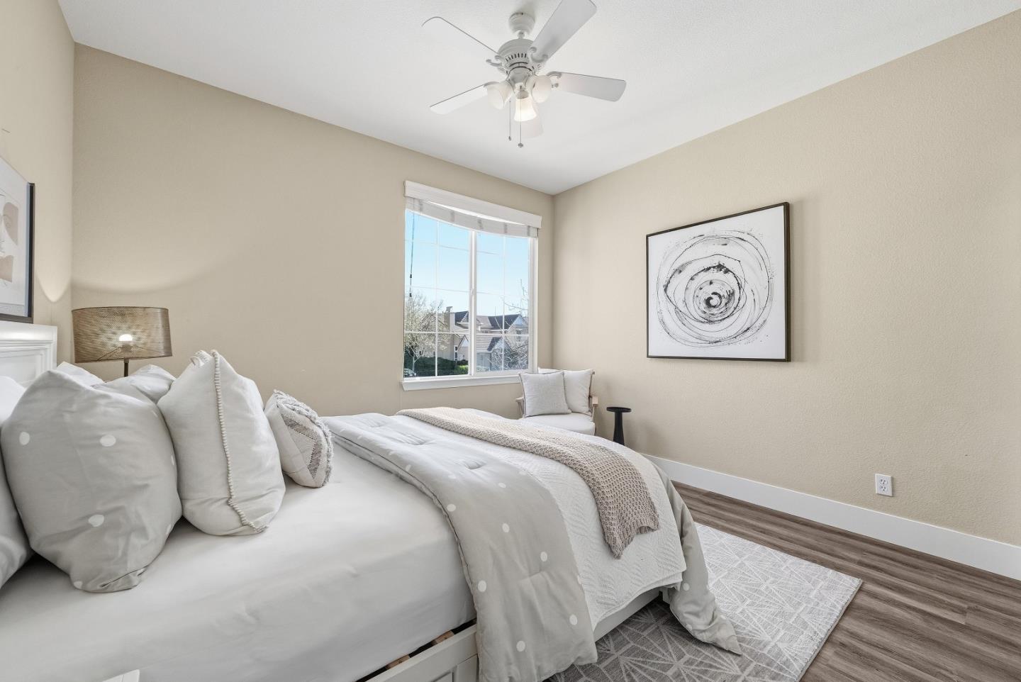 806 Mornington Court San Ramon, CA 94582 - Photo 39 of 58 a bedroom with a bed and a chandelier