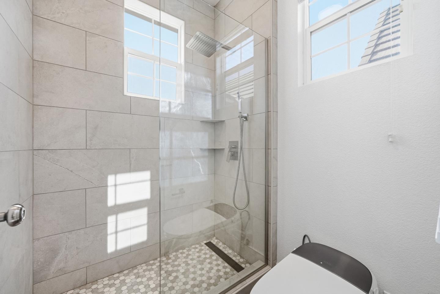 806 Mornington Court San Ramon, CA 94582 - Photo 44 of 58 a bathroom with a sink and glass door