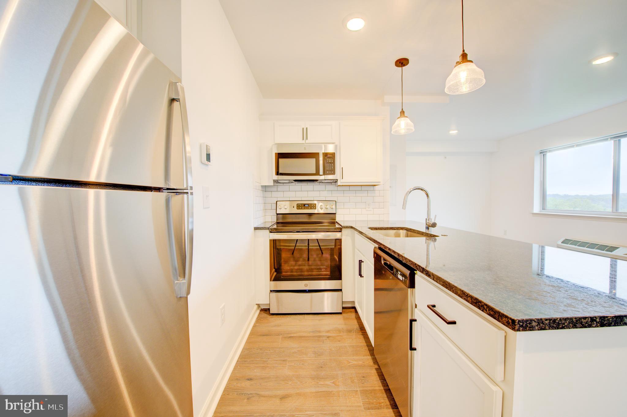 6649 Ridge Avenue, Unit B407 Philadelphia, PA 19128 - Photo 2 of 10